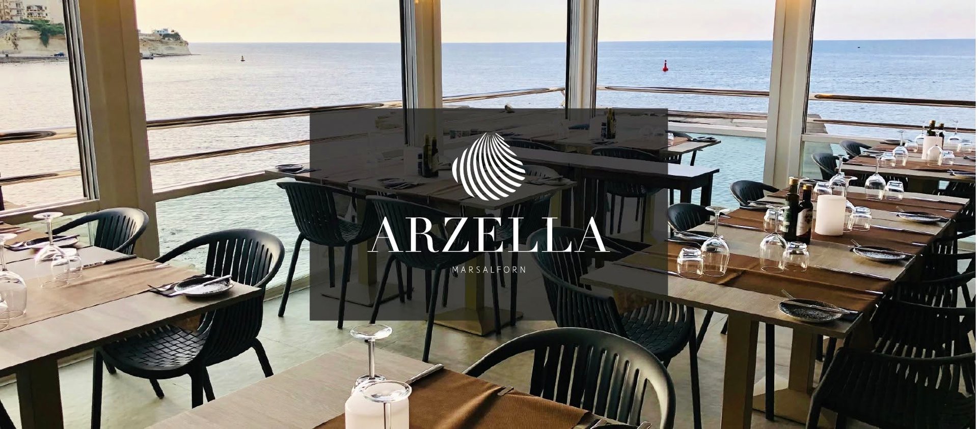 The Arzella dining room, overlooking Marsalforn harbour